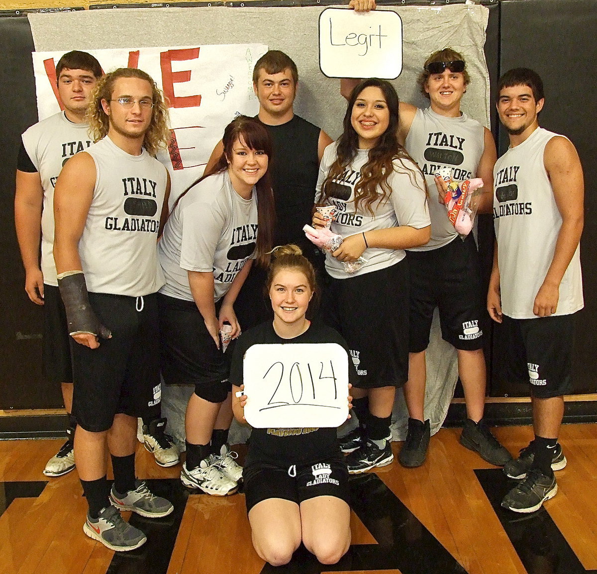 Image: Taking a group photo during last week’s yearbook signing are seniors Kevin Roldan, Shad Newman, Paige Westbrook, Zain Byers, Monserrat Figueroa, Bailey Walton, holding the “Legit” sign, Tyler Anderson and Taylor Turner who is holding the “2014” sign.