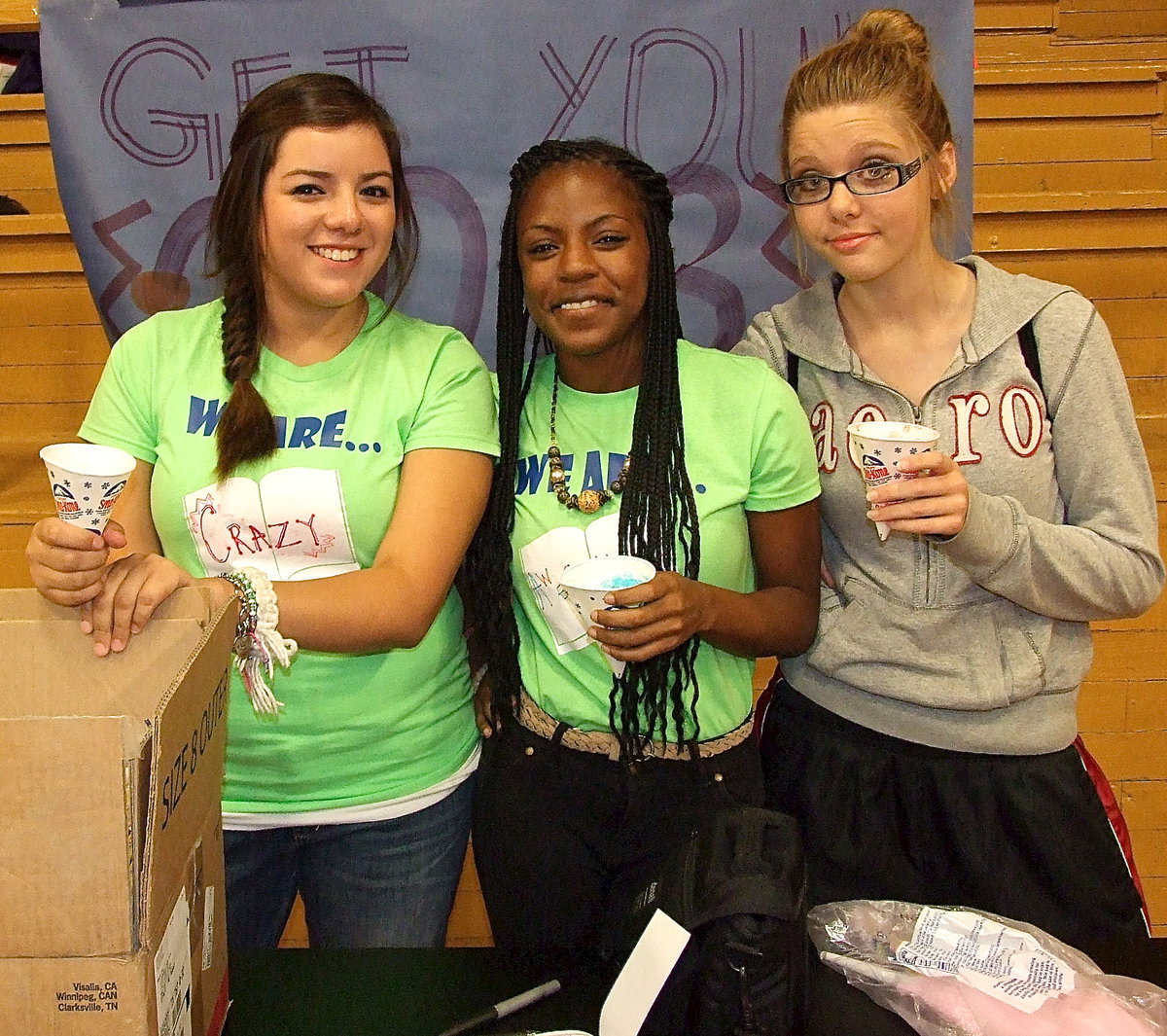 Image: Adriana Celis, Kendra Copeland and Anna Riddle enjoy snow cones.