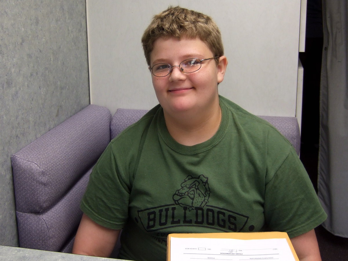 Image: Marcus Waller (7th grader) is waiting his turn to get glasses.