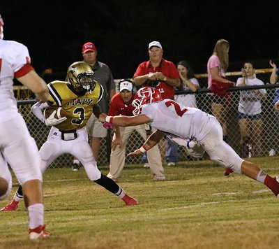 Image: Tre Robertson(3) tries to elude a Hico defender after catching a pass.