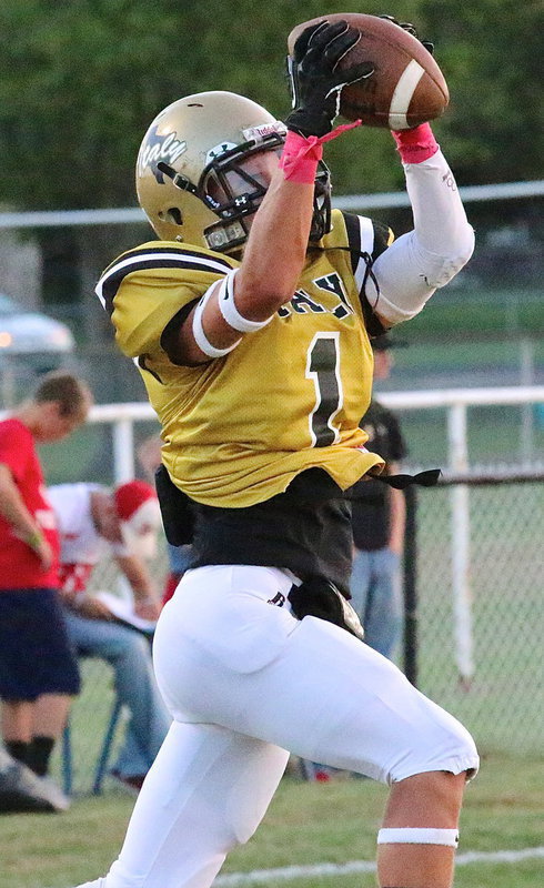 Image: Levi McBride(1) hauls in a catch during pre game warmups.