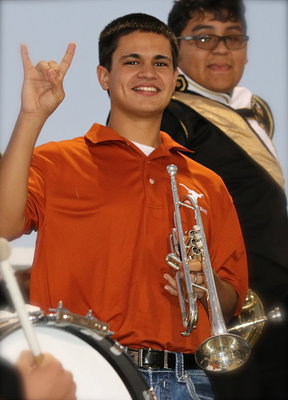 Image: Italy HS Band alumni Reid Jacinto (’13) joins in the fun while taking a break from his newest duties as a trumpeter for the Texas Longhorn Band.