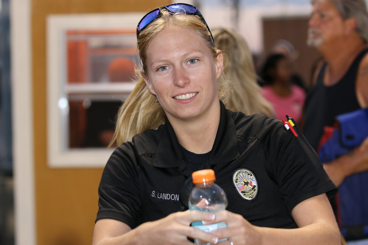 Image: Italy Police officer Shelbee Landon monitors the action at Willis FIeld.