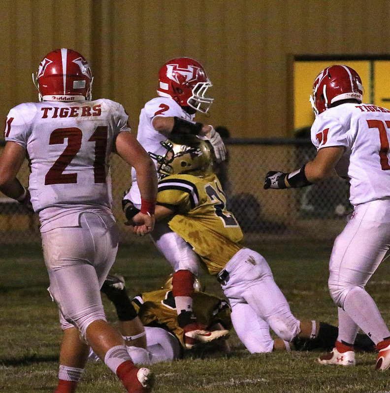 Image: Safety Ryan Connor(21) wraps up a Tiger near Italy’s goal line.