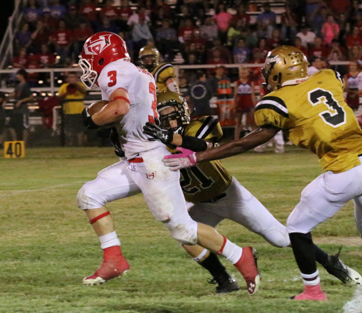 Image: Italy’s sophomore safety Ryan Connor(21) catches a Tiger by the tail before Hico can reach the endzone.