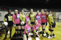 Image: A happy Lady Gladiator Varsity Volleyball team.