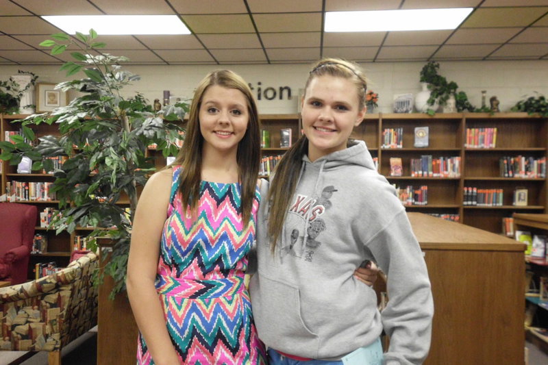 Image: Brooke DeBorde and Lillie Perry greet the guests at the reception in the library.