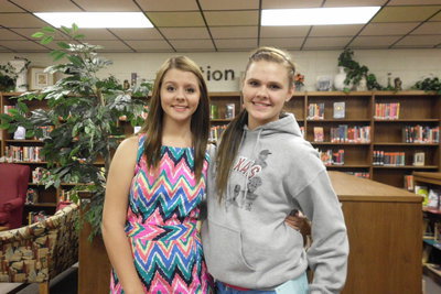 Image: Brooke DeBorde and Lillie Perry greet the guests at the reception in the library.