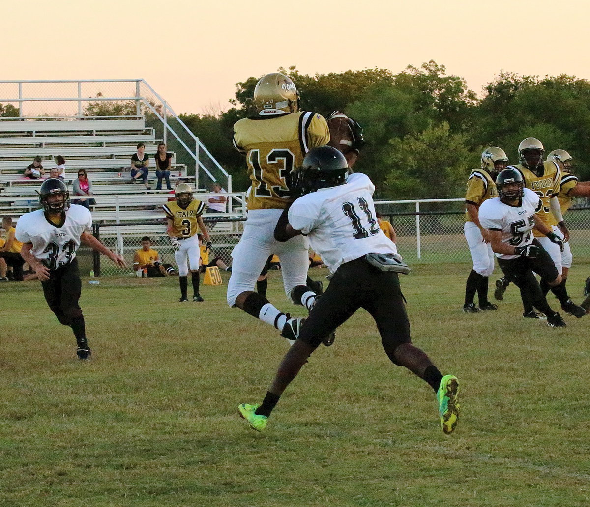 Image: JV receiver Fabian Cortez(13) nearly makes a spectacular grab but Itasca knocks the ball out.