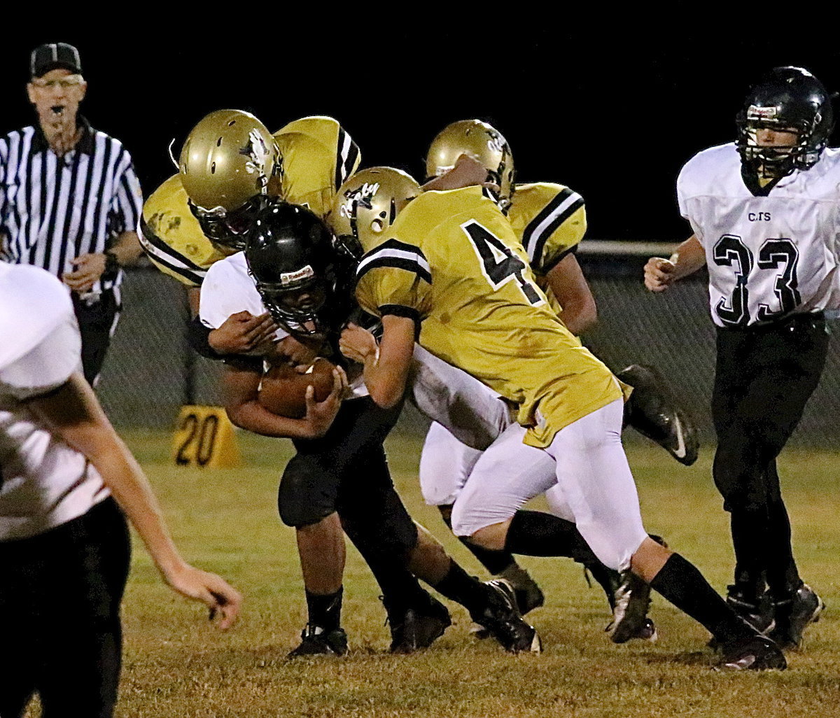 Image: David De La Hoya(60) and Justin Wood(4) bring down a Wampus Cat runner.