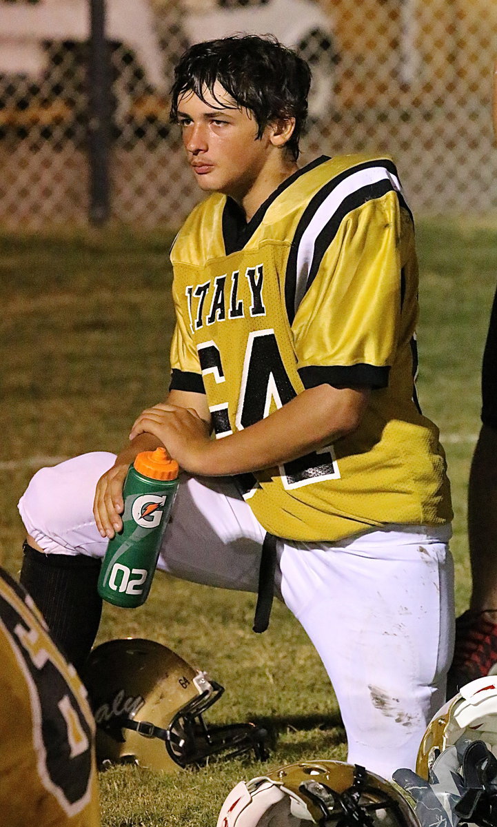 Image: This is Elliott Worsham(54) relaxing during halftime.