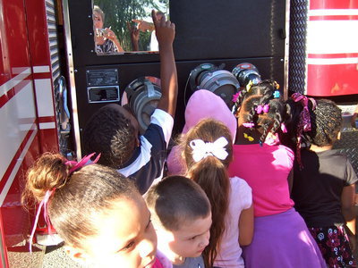 Image: Students get a close up view of the fire engine.