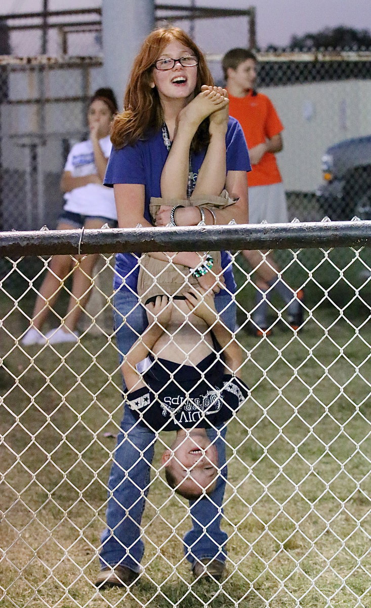 Image: Katie Connor and Trent Connor enjoy watching the games together.