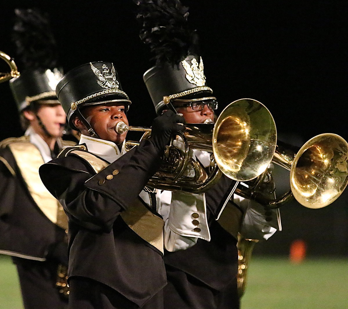 Image: Gladiator Band members play loud and proud for Itasca’s fans.