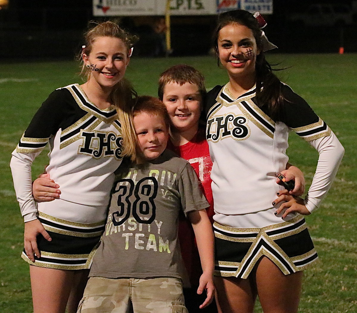 Image: This is a dream come true for cheerleaders Britney Chambers and Ashlyn Jacinto who get to pose for a picture with Ty Cash and Bryce DeBorde.