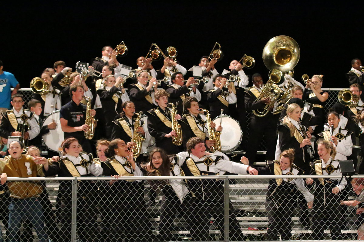 Image: Italy’s band plays, dances and cheers in response to the team’s success against the Wampus Cats.