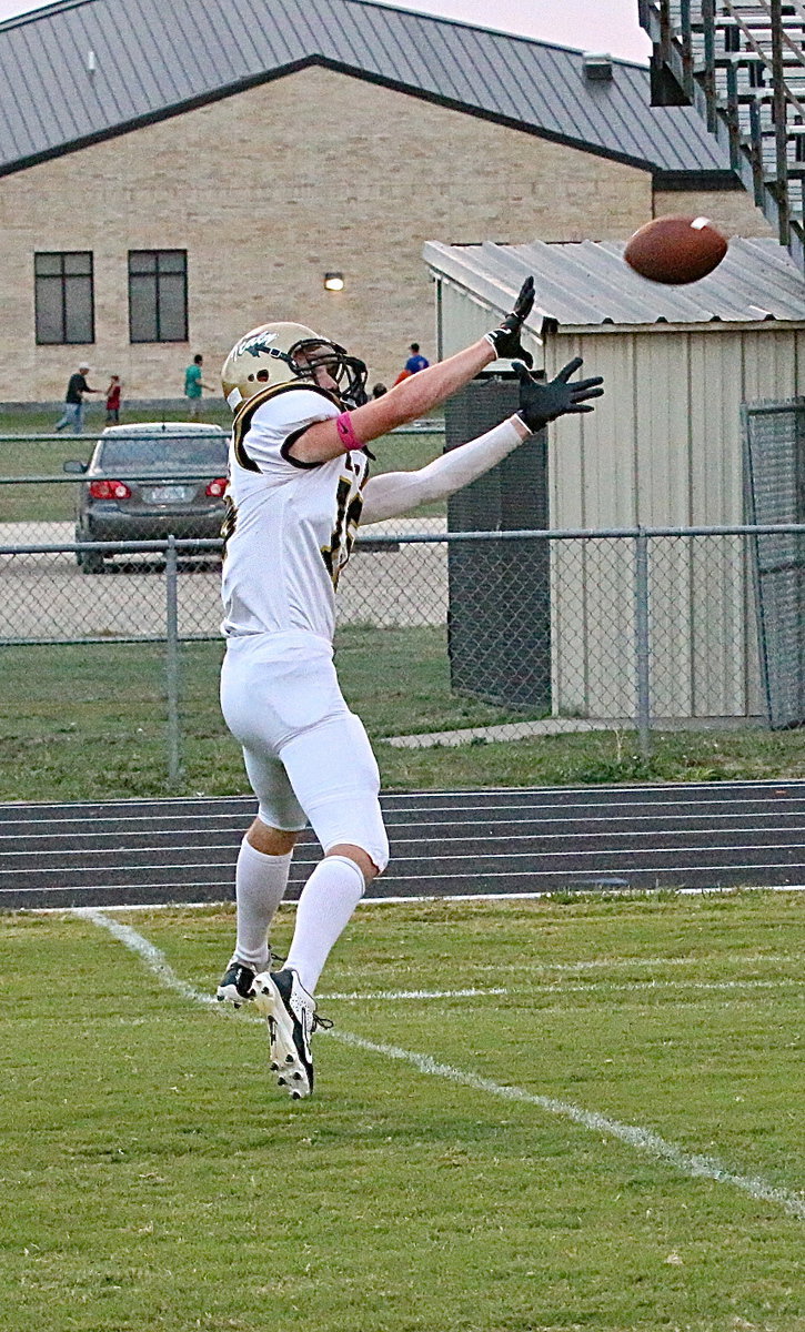 Image: Italy’s Cody Boyd(15) catches a pass during the pre-game warmups.