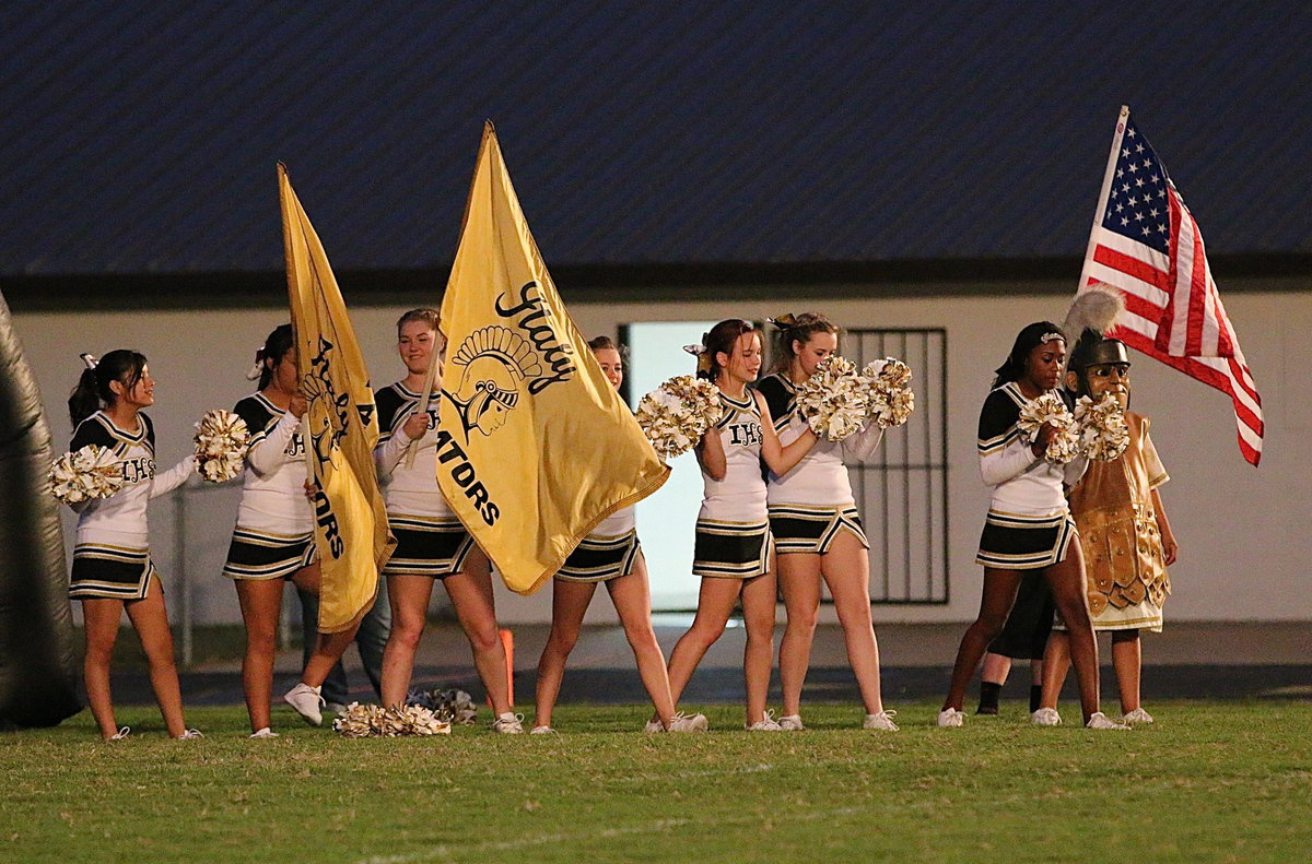 Image: Italy’s cheerleaders energize for the first-half of play against Itasca.