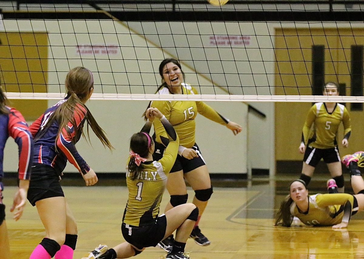 Image: Madison Washington(10) keeps the ball alive to the pleasant surprise of teammate Monserrat Figueroa(15) as Bailey Eubank(1) relies on her instincts to make the play.