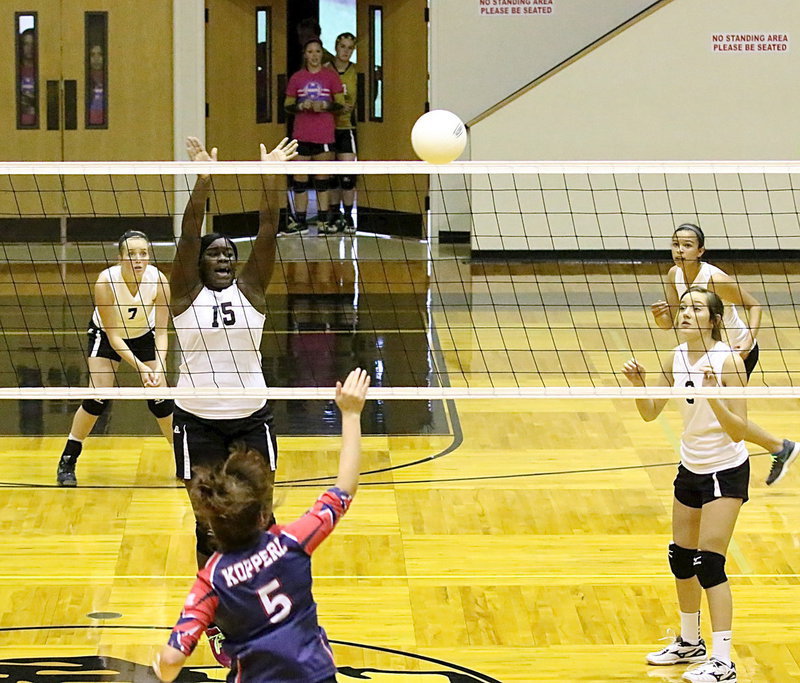 Image: Italy’s Taleyia Wilson(15) forces Kopperl’s JV to try and score around her as teammates Hannah Washington(7), Jozie Perkins(8) and April Lusk(3) move in to assist.