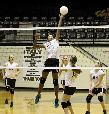 Image: Emmy Cunningham(27) helps Italy’s A-team mount a comeback after being down 18-9 in the third and final set as Brycelyn Richards(23), Annie Perry(13), Kirby nelson(19) and Grace Haight(29) each play a part during the rally.