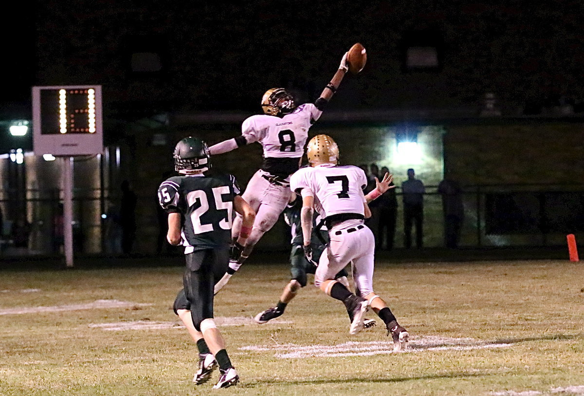 Image: Safety Trevon Robertson(8) bats down a desperation pass by the Bobcats.