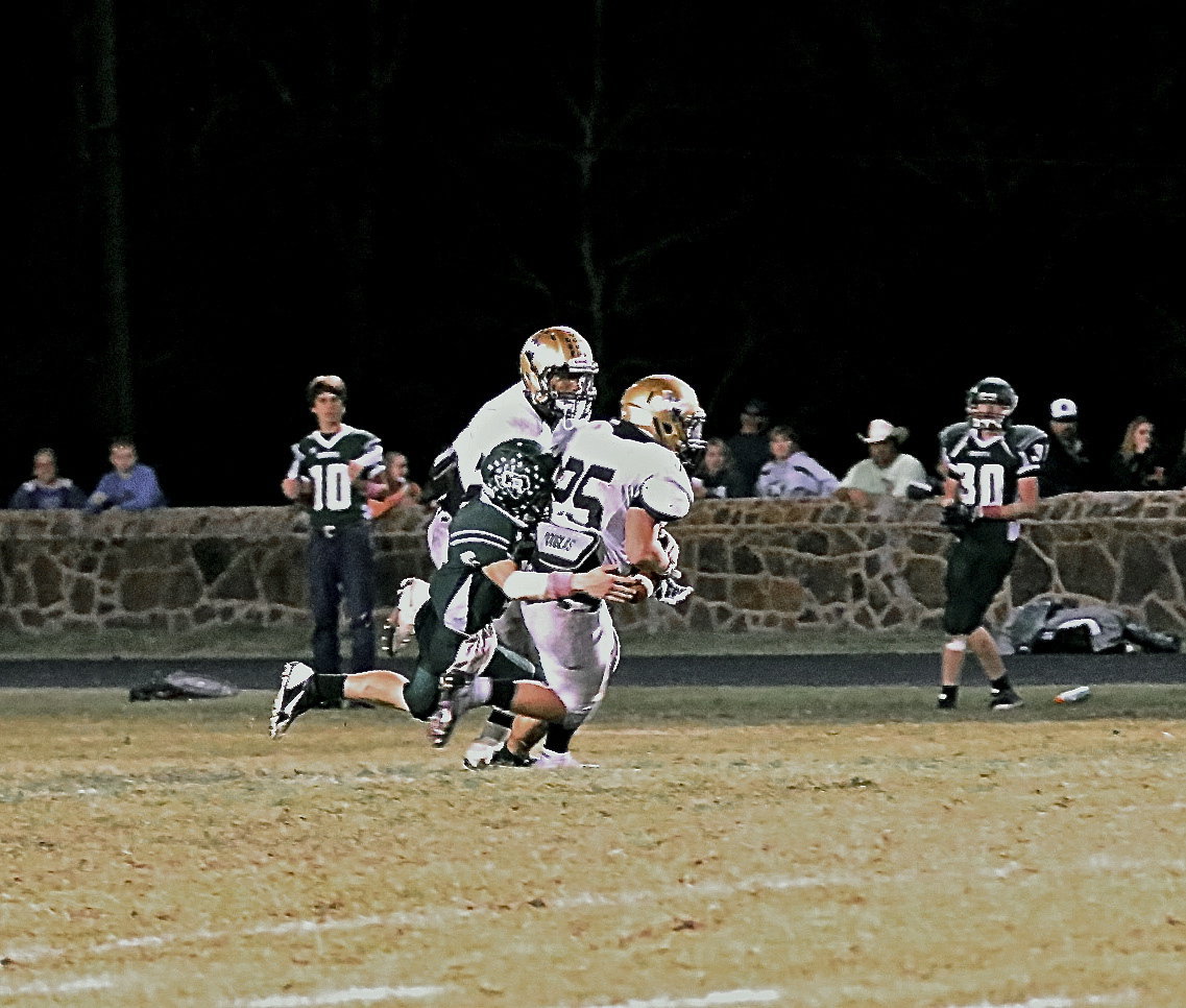 Image: With Crossroads driving, linebacker Shad Newman(25) earned his team’s Defensive Player of the Game honor after picking off this pass to maintain Italy’s 34-30 advantage late in the fourth-quarter.