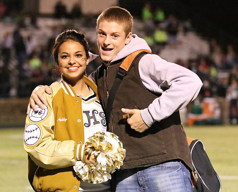 Image: Italy High School cheerleader Ashlyn Jacinto and water boy Clay Riddle are ready for the district battle between the Gladiators and the Crossroads Bobcats.