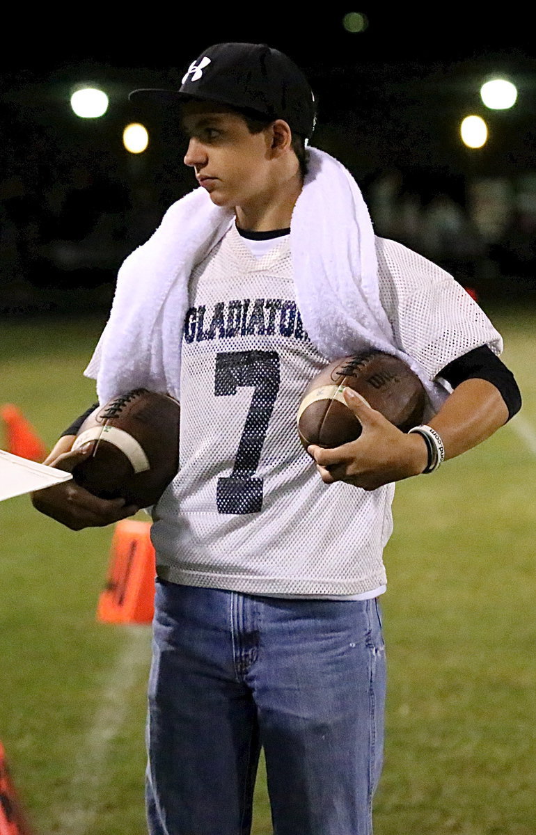 Image: Water boy Gary Escamilla was a busy Gladiator Friday night.