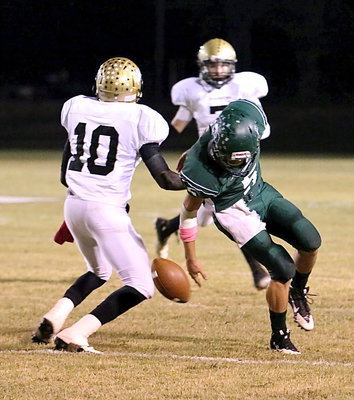 Image: TaMarcus Sheppard(10) breaks up a Bobcat pass attempt in the early going.