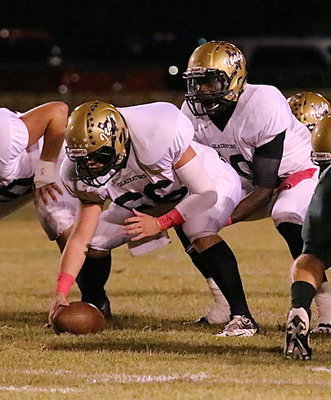 Image: Junior center Kyle Fortenberry(66) snaps to QB TaMarcus Sheppard(10). Italy’s offense starts right here.