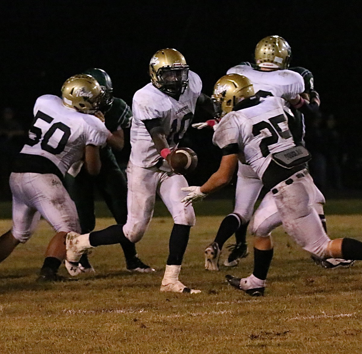 Image: Italy QB TaMarcus Sheppard(10) hands off to fullback Shad Newman(25) who gains 49 yards rushing on the night on 10 carries.