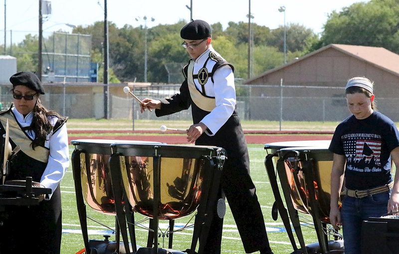 Image: Blake Brewer brilliantly sets the tone on the timpani as Lorena Rodrigues handles the cymbols and as pit crew member Tatum Adams supports the war effort.
