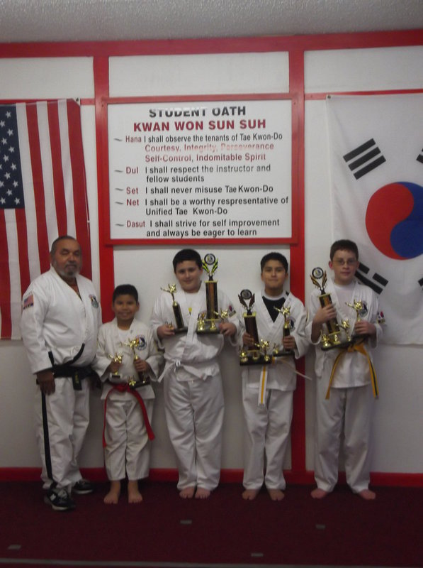 Image: Pictured are some of these students from the Italy area. Master Charles Kight-Chief Instructor of the school, Nick Sam-Italy, Rocklin Ginnett-Italy. Michael Gonzales-Italy and Michael Russell-Italy, Isamar and Mario Perez-Black Belts from Milford were not available for the picture.