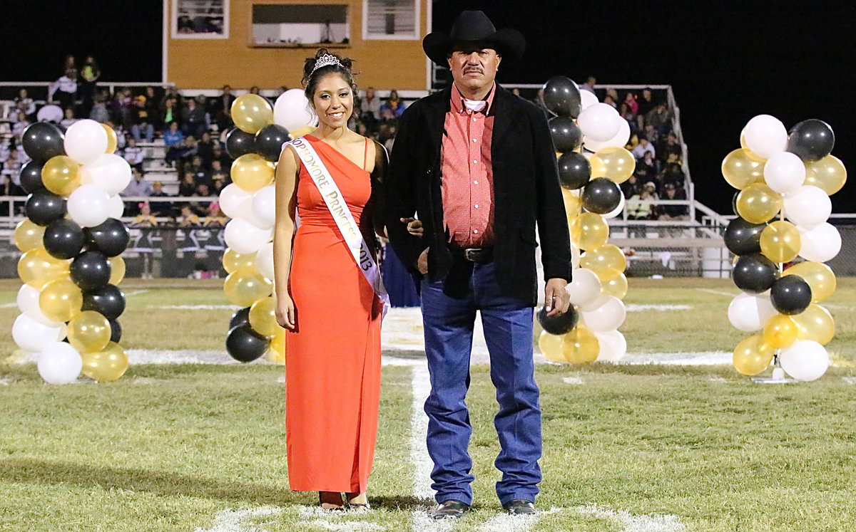 Image: 2013 Sophomore Princess, Julissa Hernandez is escorted by her father, Pedro Hernandez.