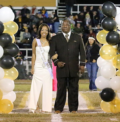 Image: 2013 Homecoming Nominee, Ryisha Copeland, is escorted by her father, Kenneth Copeland.