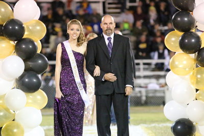 Image: 2013 Homecoming Nominee, Brianna Riddle, is escorted by her father, Kenny Rose, Sr.