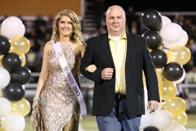 Image: 2013 Homecoming Nominee, Taylor Turner, is escorted by her father, Lee Turner.