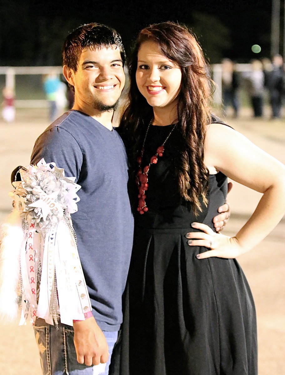 Image: Gladiator senior Tyler Anderson(11) and Lady Gladiator Volleyball senior Paige Westbrook bask in the glow of a homecoming victory!