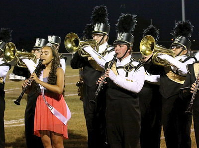 Image: Band members Lillie Perry, Freshman princess Vanessa Cantu, Hunter Wood, Trevor Patterson and Pedro Salazar help make homecoming an event.