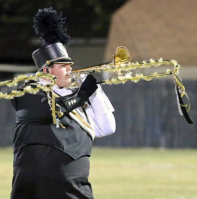 Image: Zac Mercer and his decorated trombone, it must be homecoming!