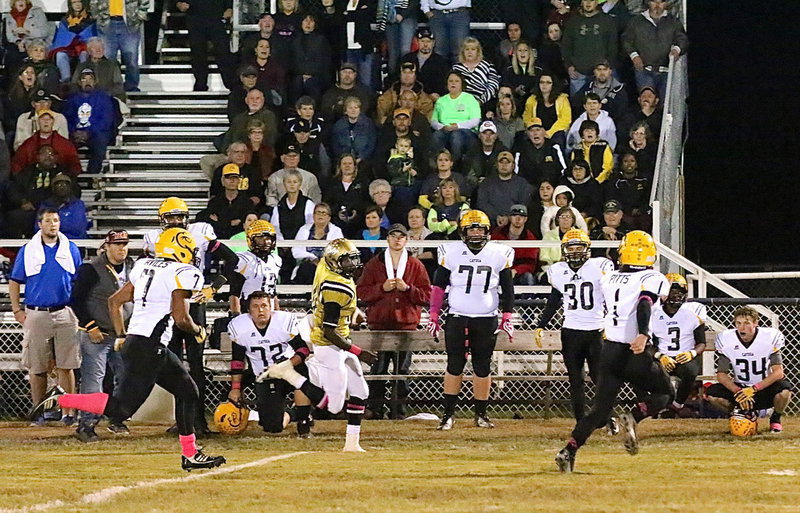 Image: TaMarcus Sheppard(10) is on his way to a 253 yard rushing night on 18 carries, and all Cayuga and their fans can do is watch.