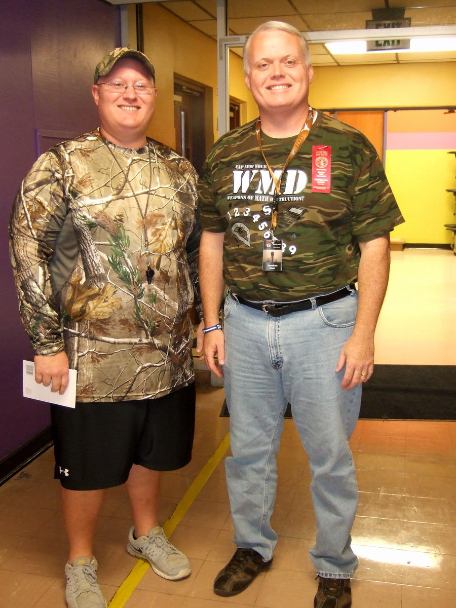 Image: Brandon Ganske (P.E. teacher) and principal Jonathan Nash get into Red Ribbon week with all their “Camo.”