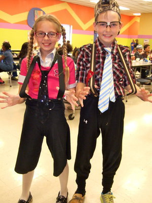 Image: Sorienna Maynard and Grant Morgan showing off their nerdy outfits.
