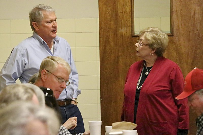 Image: Robert Owen and Jane Gorman Acker catch up on old times.