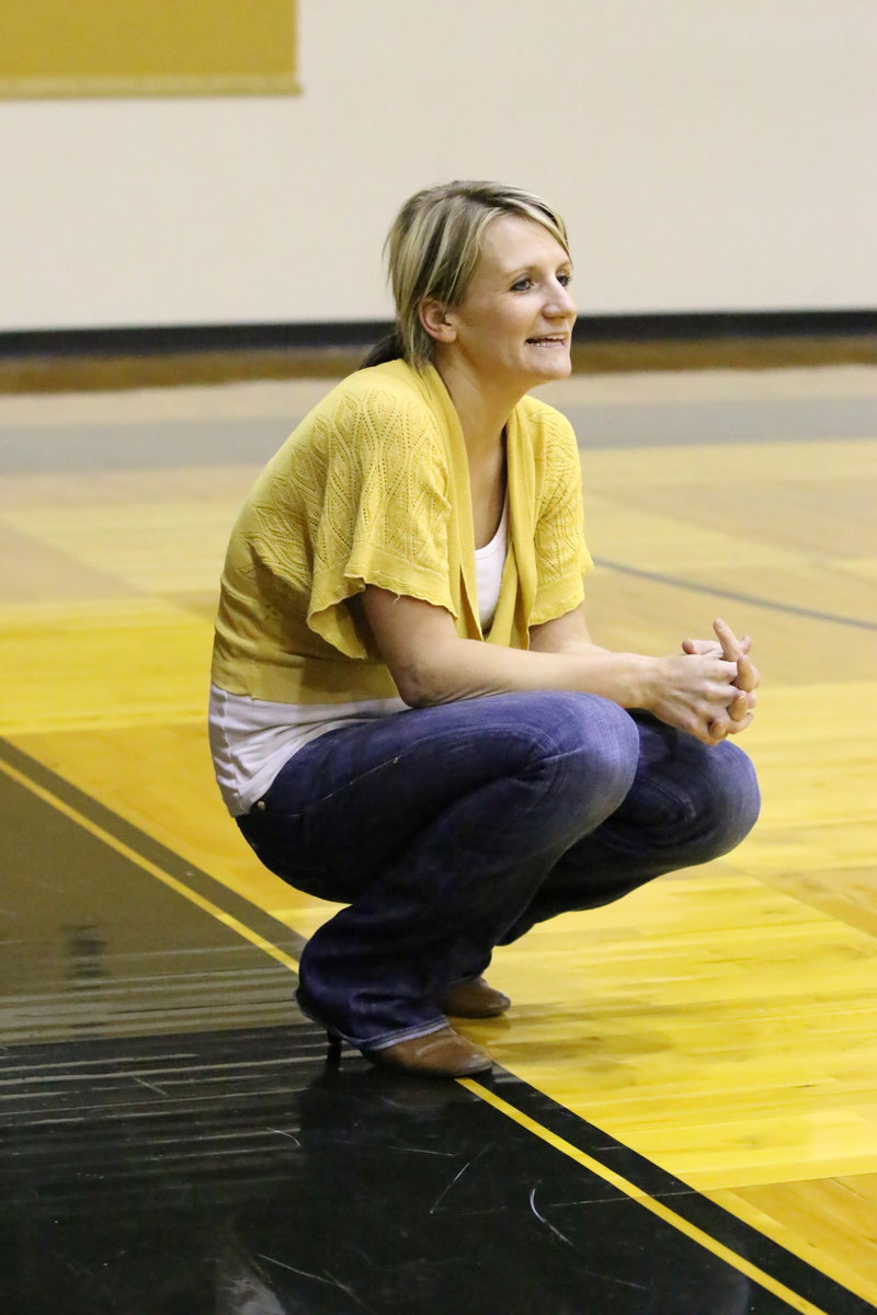 Image: First-year head coach Morgan Mathews instructs her Lady Gladiator volleyball players from the sideline.