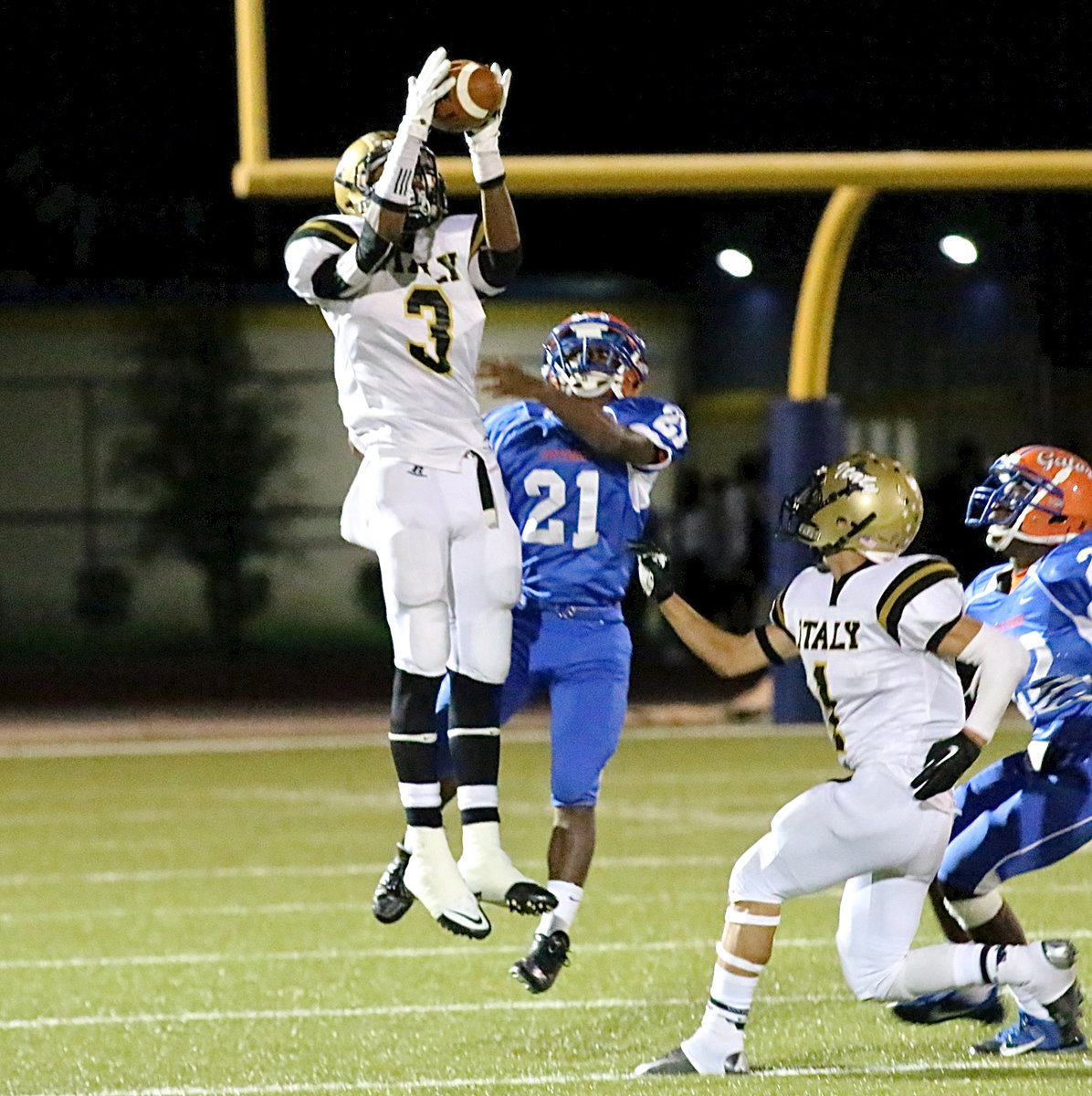 Image: Senior receiver Trevon Robertson(3) leaps for a catch to help his offense get in rhythm late in the first-half. Italy continued to trail 24-7 at the break but came back to win the game in the final minute of play.