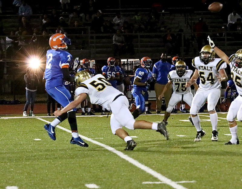 Image: Gladiator defensive end Zain Byers(50) causes intentional grounding to be called against Gateway in the second-half after Byers forced the Gator quarterback out of the game, temporarily, with an attention-getting rib shot in the first-half.