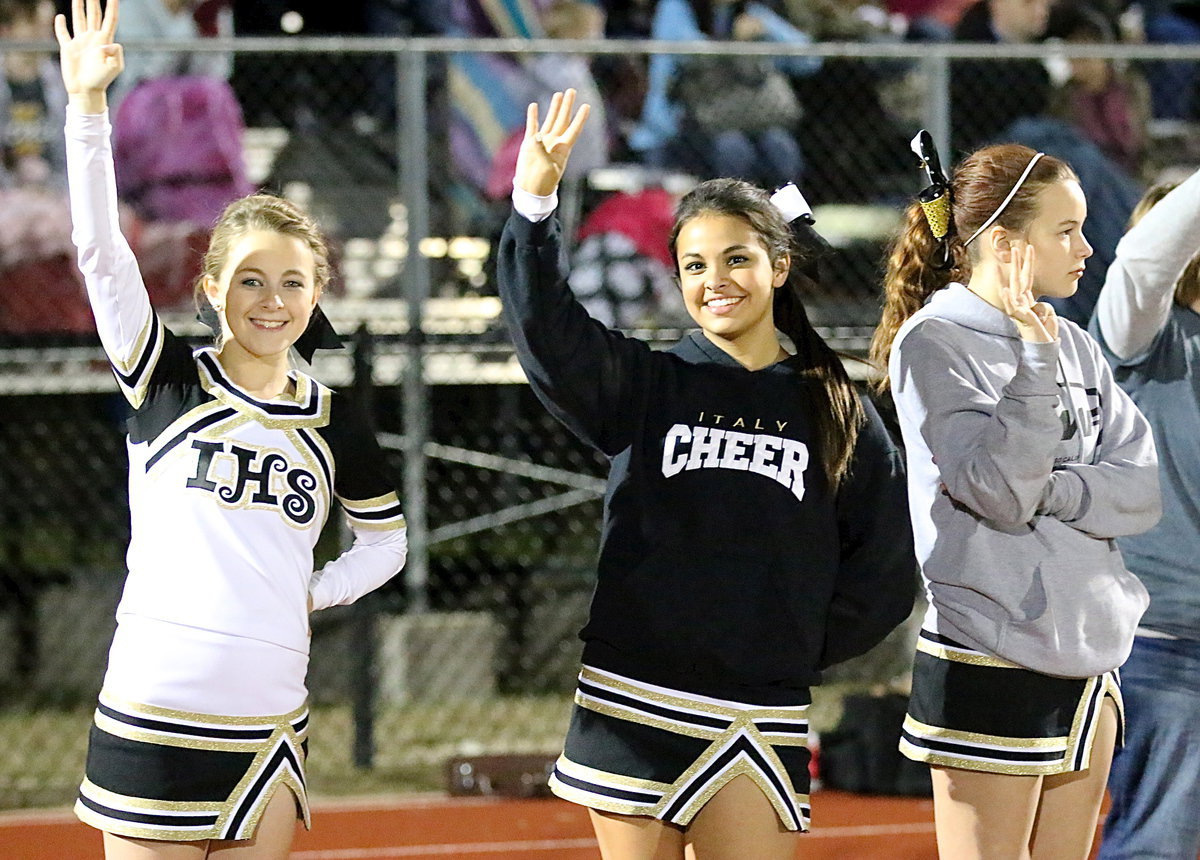 Image: Cheerleaders Britney Chambers, Ashlyn Jacinto and Paige Little are confident going into the fourth-quarter despite Italy trailing 24-14 behind Gateway.