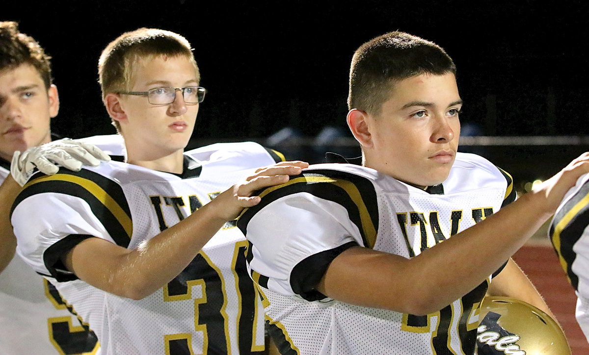 Image: Gladiators’ Hunter Ballard(30) and Eli Garcia(36) during the playing of the anthem.